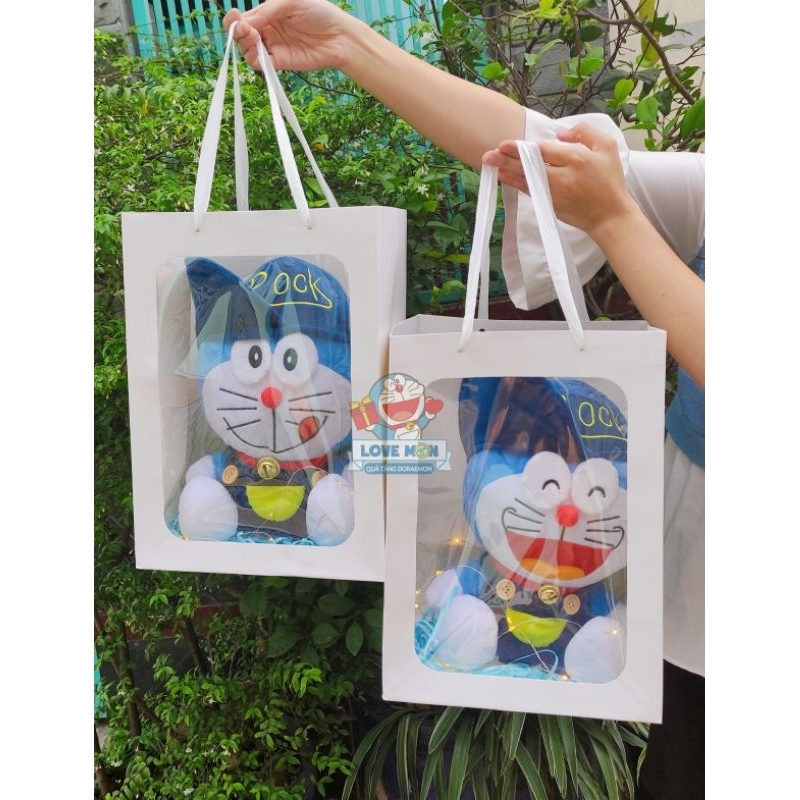 ] GẤU BÔNG DORAEMON KÈM TÚI GIẤY KÍNH DỄ THƯƠNG