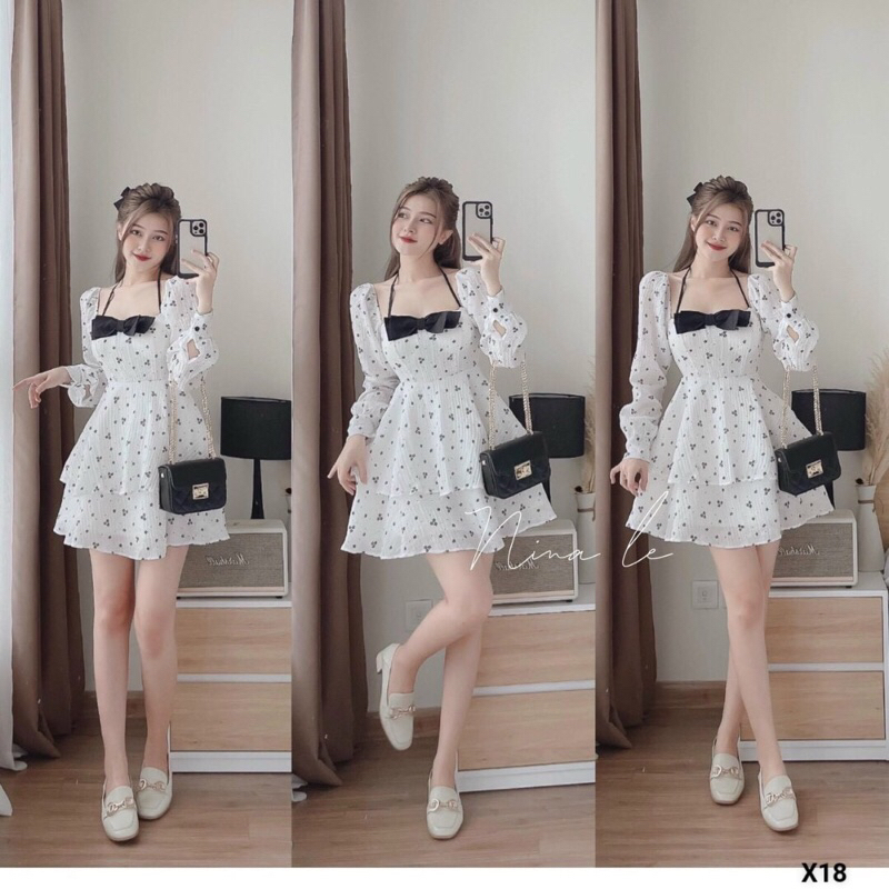 Đầm Xốp Hoa Nhí Đính Nơ Ngực Tay Dài Xoè Bồng