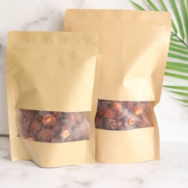 Đào Nâu Chẻ Đôi Sấy Dẻo mẫu túi kraft 500gr, chua ngọt nhẹ.