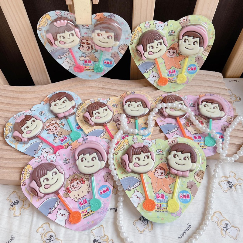 Vĩ 2 que kẹo mút socola Peko Fujiya Nhật