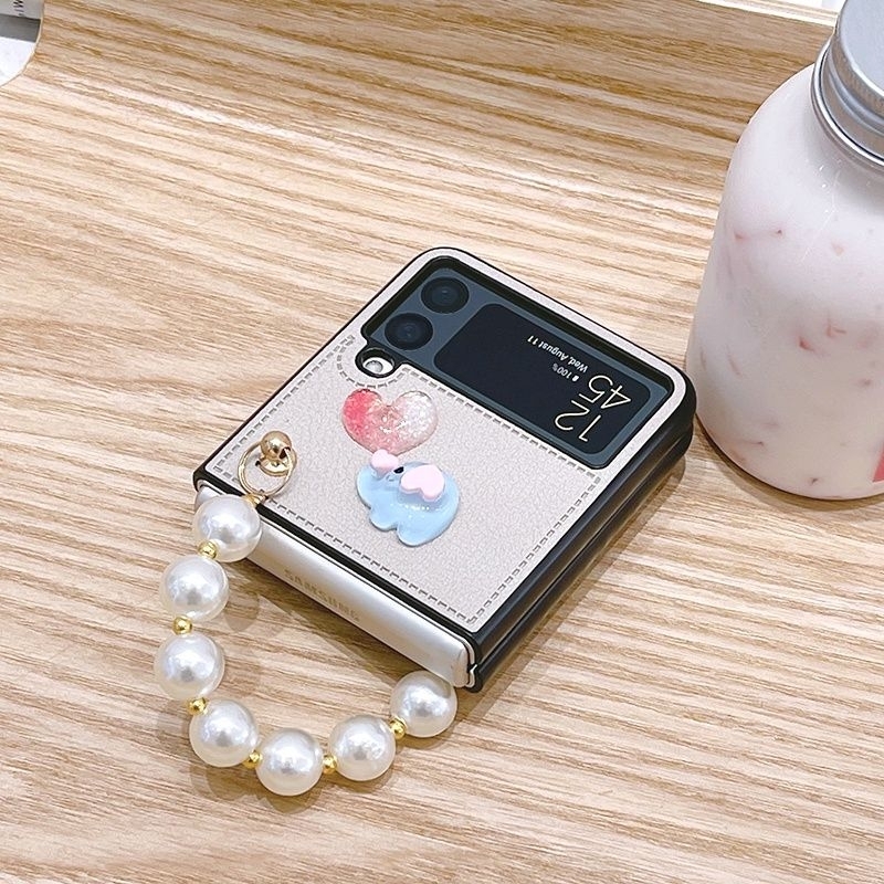 Ốp Z Flip 4 - Z Flip 3 - Z Flip3 - FLIP4 5G phủ da PU charm voi tim lấp lánh kèm dây ngọc tiểu thư dễ thương