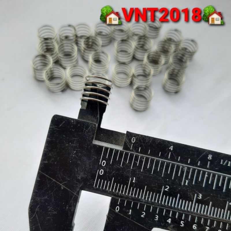 Lò xo nén inox phi 9x7mm