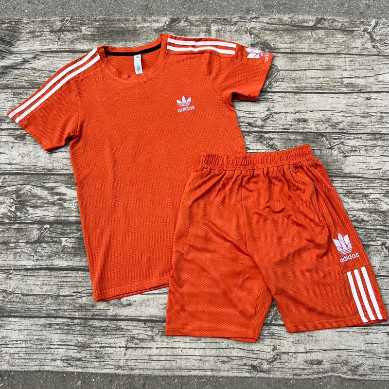 Bộ thể thao cộc tay nam, bộ xốp nam thêu logo cao cấp chất liệu vải xốp bóng co dãn thấm hút mồ hôi tốt