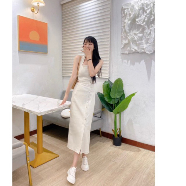 Đầm yến midi kem xẻ đùi nút lệch cut-out lưng