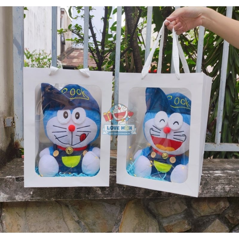 ] GẤU BÔNG DORAEMON KÈM TÚI GIẤY KÍNH DỄ THƯƠNG
