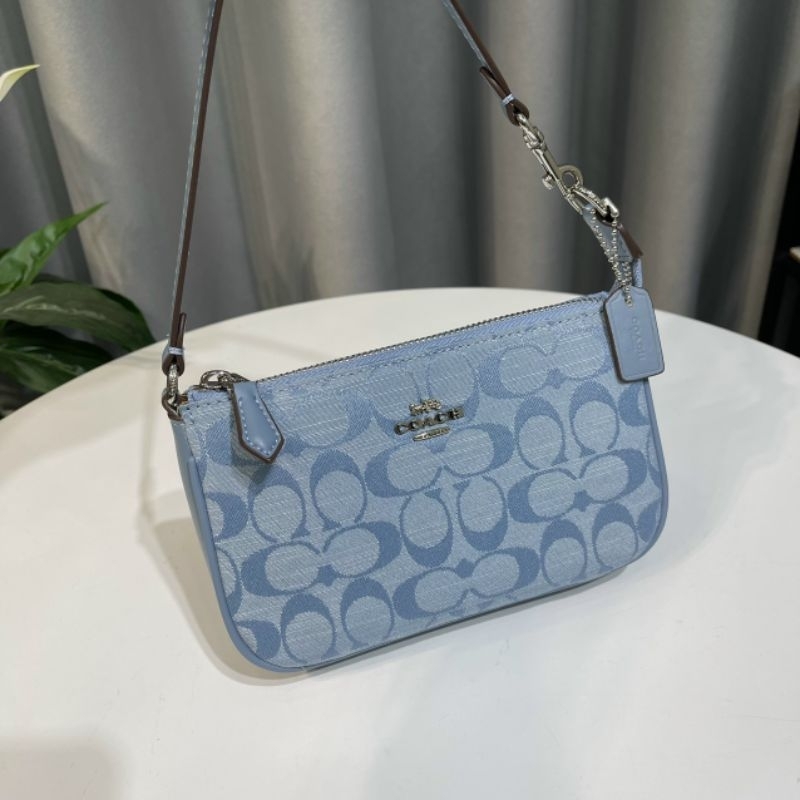 Túi Coac*h Nolita 19 kẹp nách sang trọng