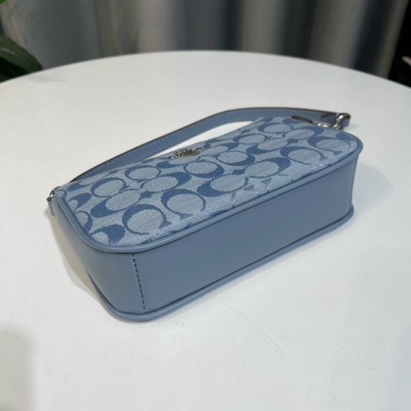 Túi Coac*h Nolita 19 kẹp nách sang trọng