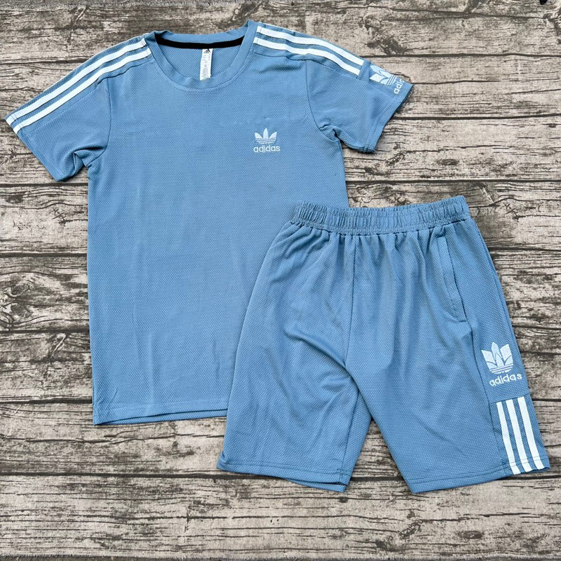 Bộ thể thao cộc tay nam, bộ xốp nam thêu logo cao cấp chất liệu vải xốp bóng co dãn thấm hút mồ hôi tốt