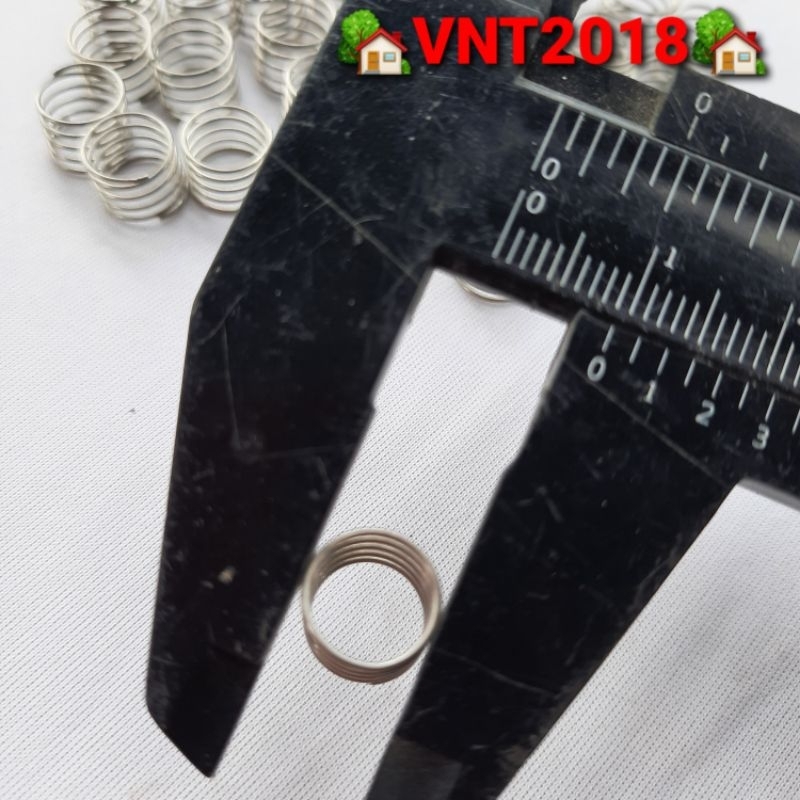 Lò xo nén inox phi 9x7mm