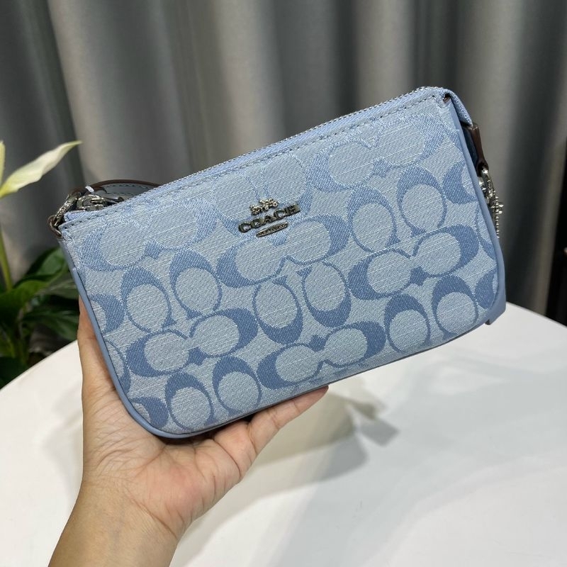 Túi Coac*h Nolita 19 kẹp nách sang trọng