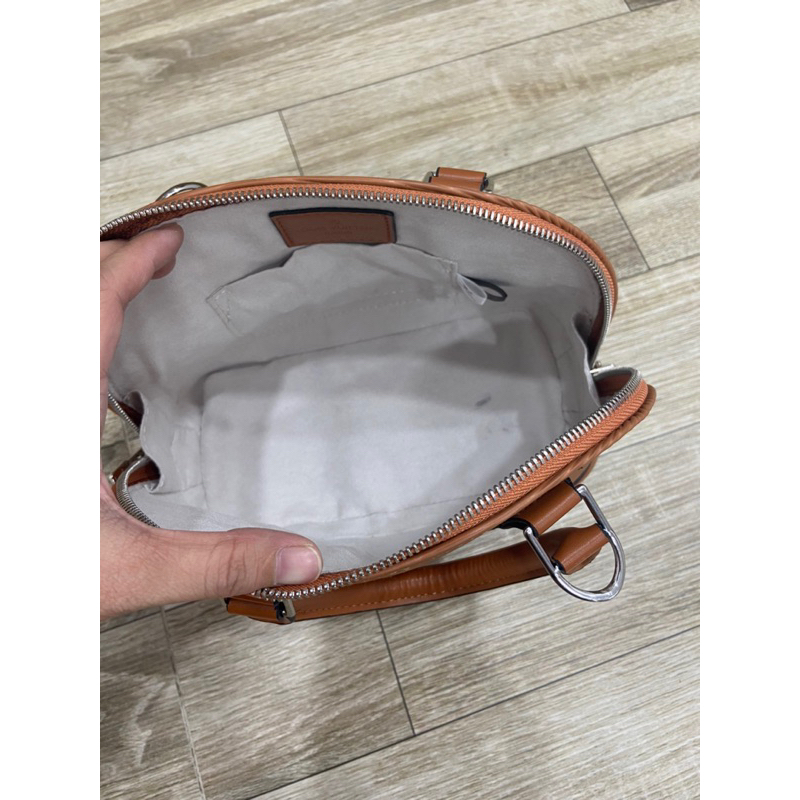 Túi si da tăm LV hến