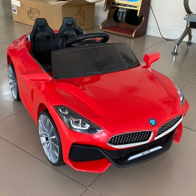 Ôtô ₫iện trẻ em ₫iều khiển từ xa 2 chỗ ngồi BMW Z4 -còn mới 99%