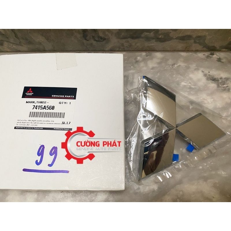 Biểu tượng mặt ga lăng Mitsubishi Attrage 2020, New Triton 7415A560 (Logo ca lăng)