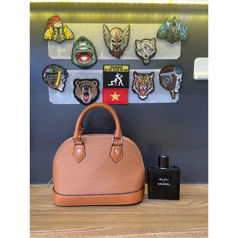 Túi si da tăm LV hến