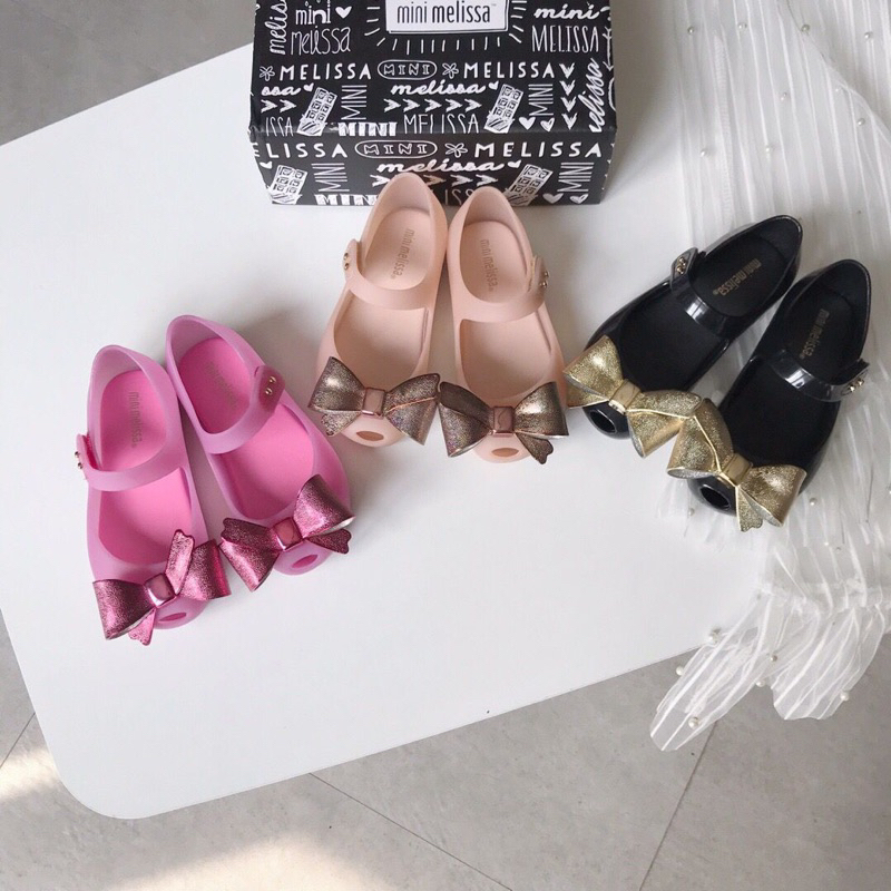 Giày nhựa thơm Melissa xuất dư dáng hở mõm cho bé gái