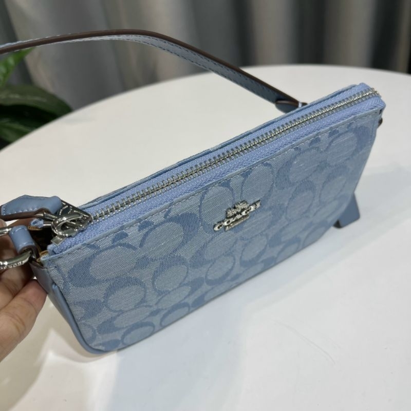 Túi Coac*h Nolita 19 kẹp nách sang trọng