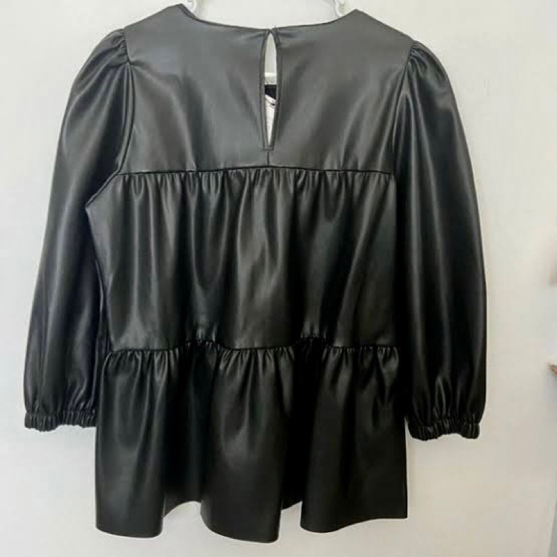 Áo da tay phồng Zara