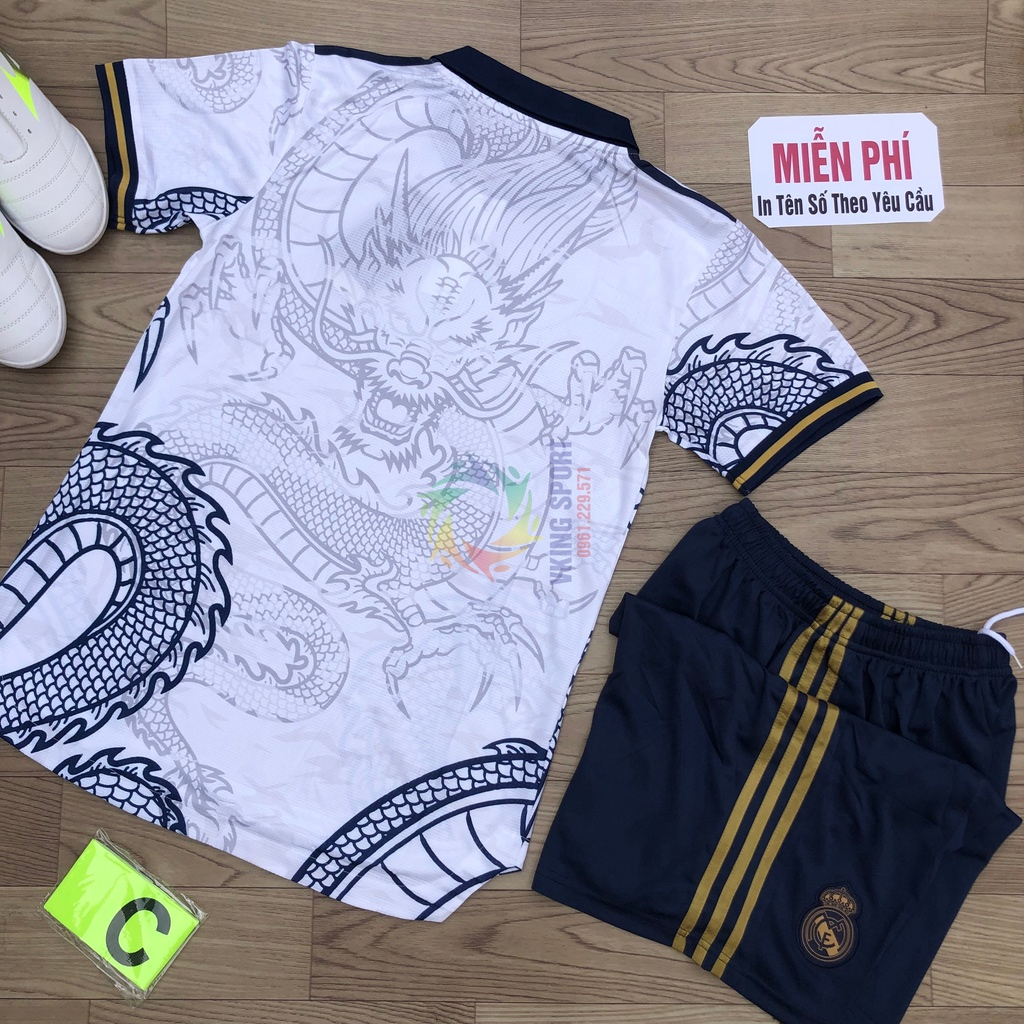 Bộ Quần Áo Bóng Đá Real Madrid Vân Rồng Vải Gai Thái Có In Tên Số Theo Yêu Cầu