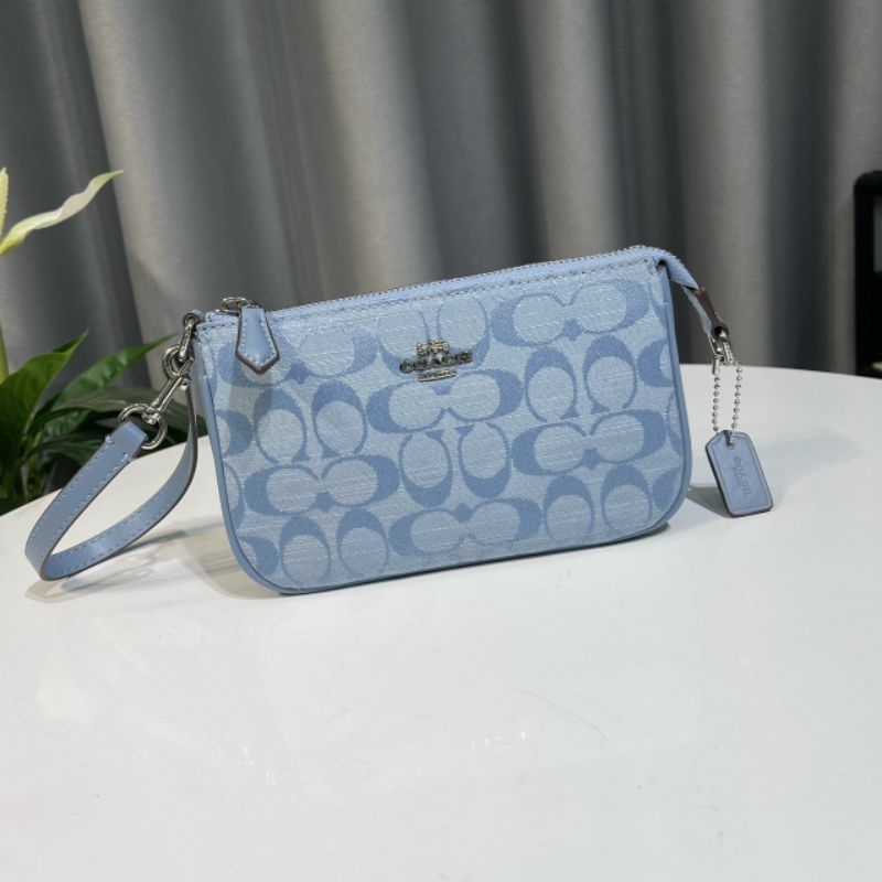 Túi Coac*h Nolita 19 kẹp nách sang trọng