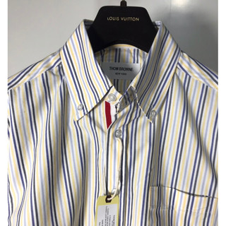 Sơ mi Thom brown sọc vàng