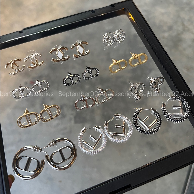 - Khuyên Tai SC Chan** new