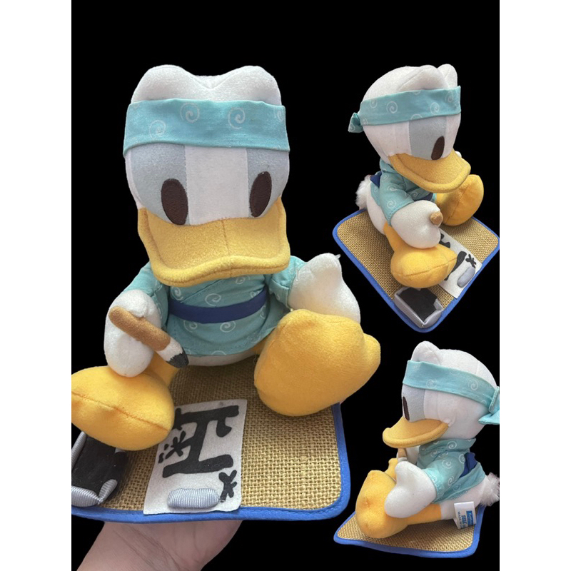 Gấu Bông Vịt Duck Donald viết Thư Pháp
