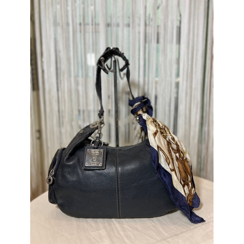 Túi da bò nguyên tấm xanh đen buộc khăn