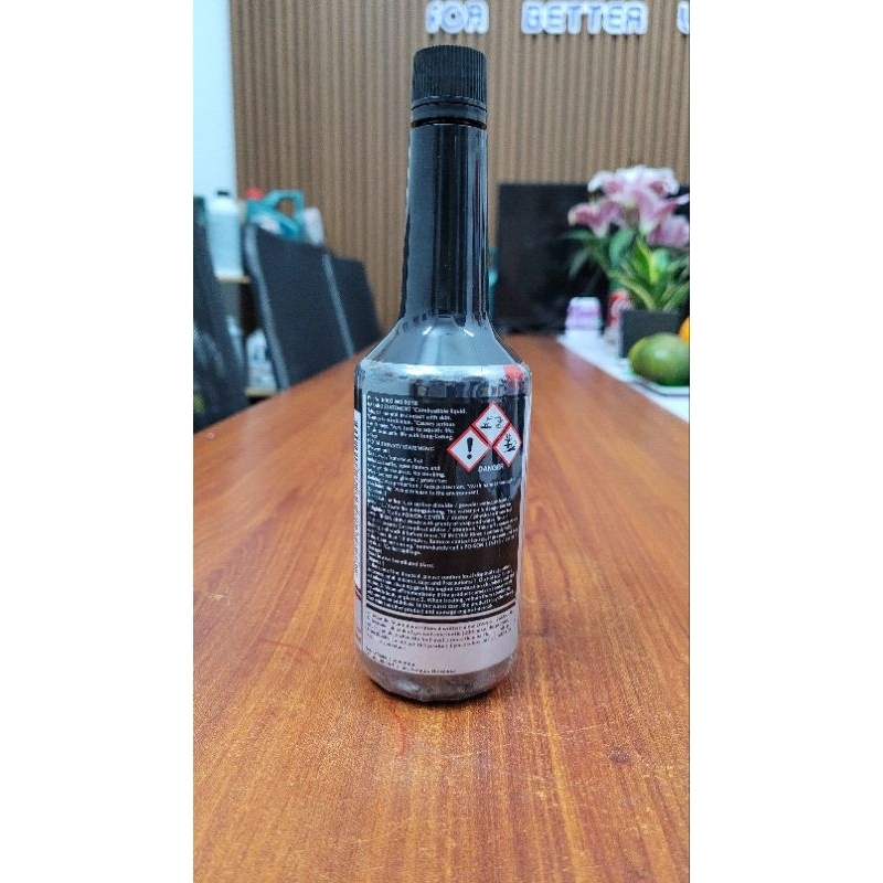 Dung dịch đổ bình xăng làm sạch buồng đốt và kim phun Mazda Deposit Cleaner 200ml