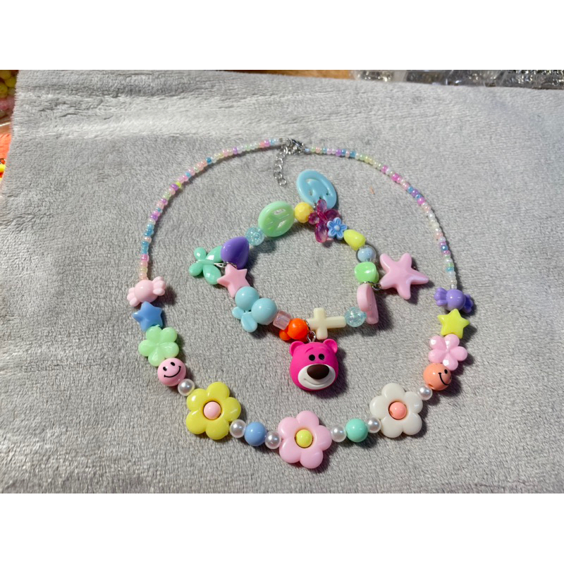 Bộ vòng tay và vòng cổ gắn tên theo yêu cầu