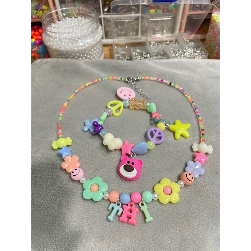 Bộ vòng tay và vòng cổ gắn tên theo yêu cầu