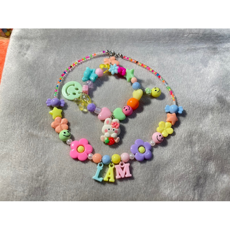 Bộ vòng tay và vòng cổ gắn tên theo yêu cầu