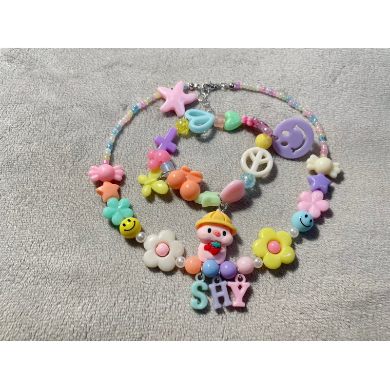 Bộ vòng tay và vòng cổ gắn tên theo yêu cầu