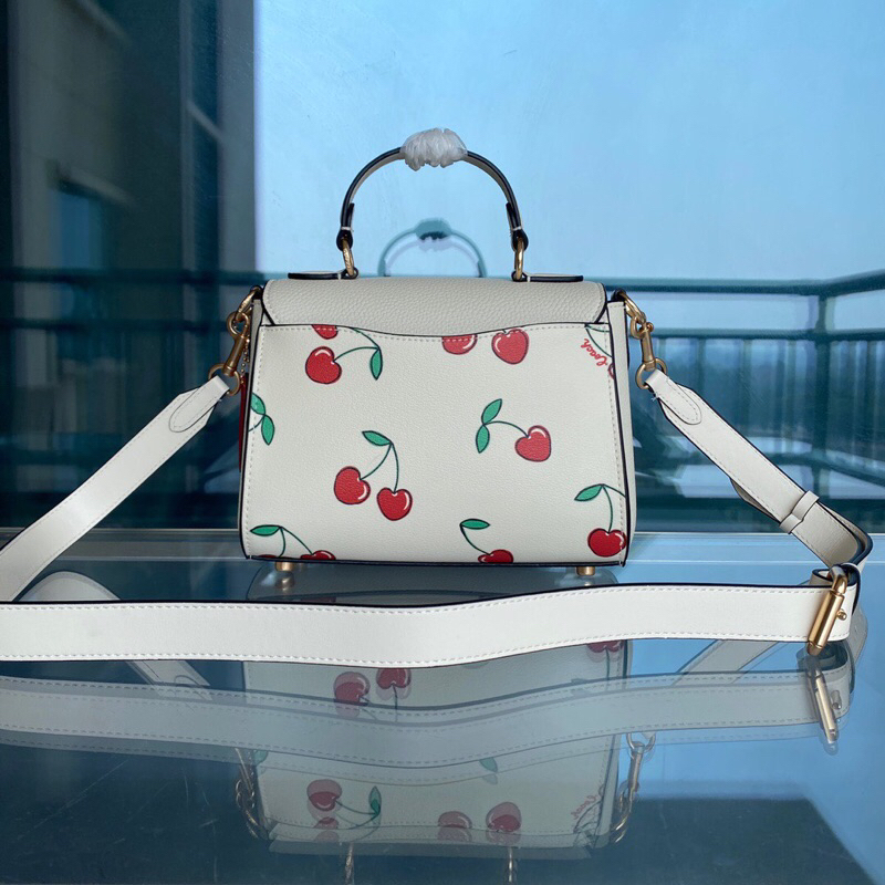 Túi Coach hoạ tiết cherry