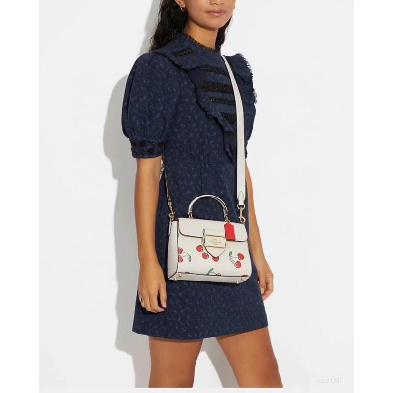 Túi Coach hoạ tiết cherry