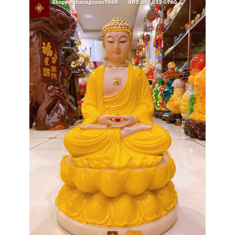 Tượng Đức Phật A Di Đà bằng sứ màu vàng/xanh (cao 38,dài 23, rộng 23)