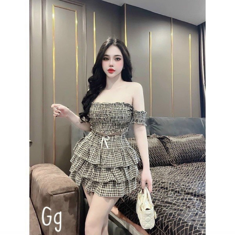 SET ÁO NHÚN BỆT VAI ĐÍNH NƠ PHỐI CHÂN VÁY TẦNG