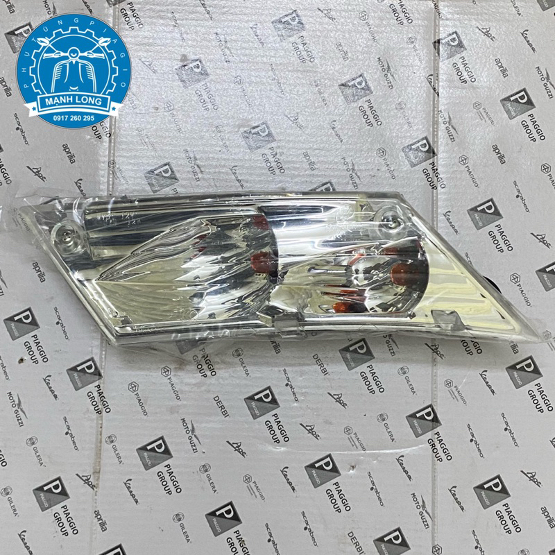 Cụm Xi nhan Sau Piaggio Zip