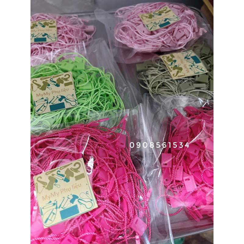 Dây treo nhãn mác quần áo  - khoảng 100 sợi
