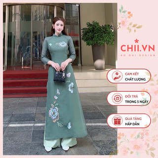 Áo dài cách tân thêu hoa chất liệu tơ mộc màu xanh