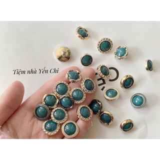 1 khuy nhựa màu xanh ngọc cao cấp,sang trọng cỡ 1.8cm