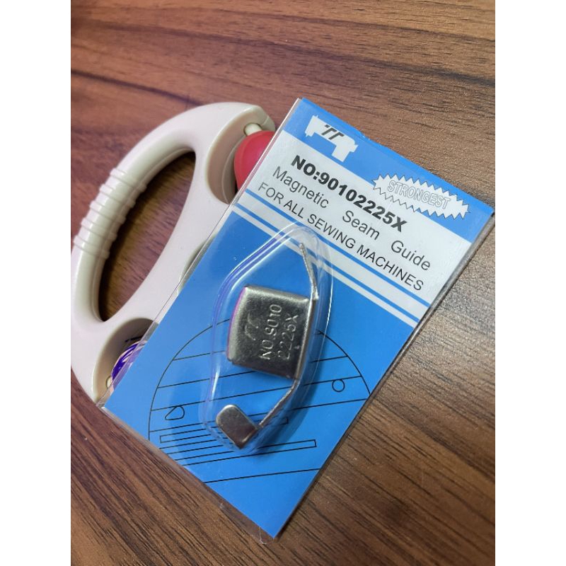 Cữ nam châm định hướng vải may