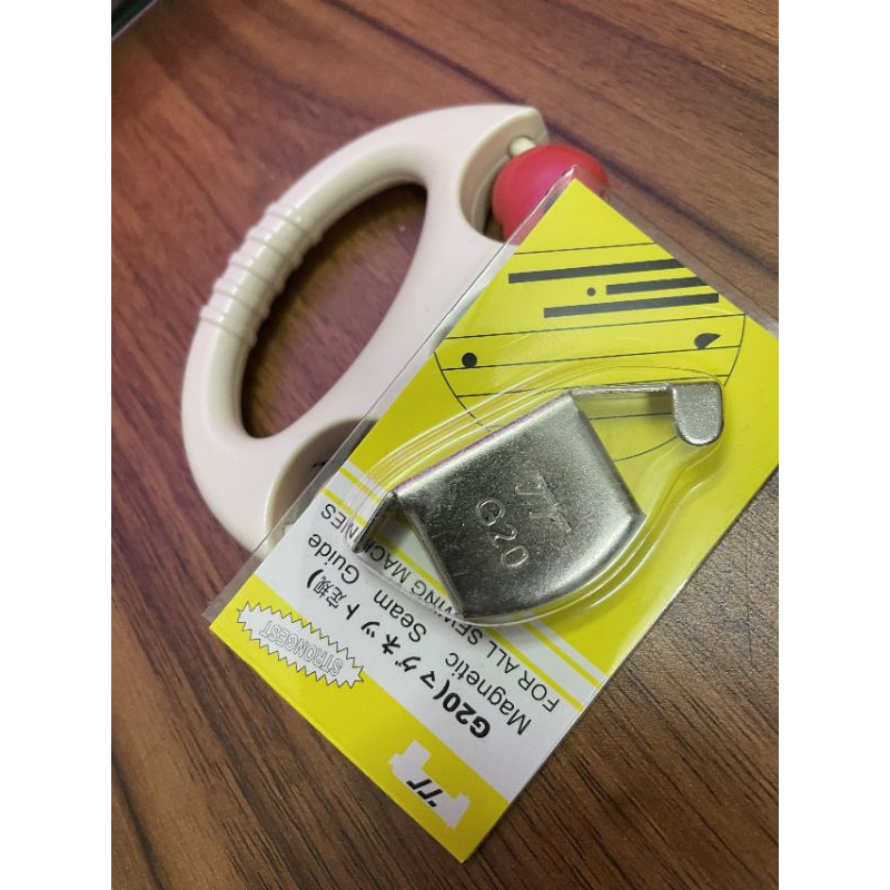 Cữ nam châm định hướng vải may