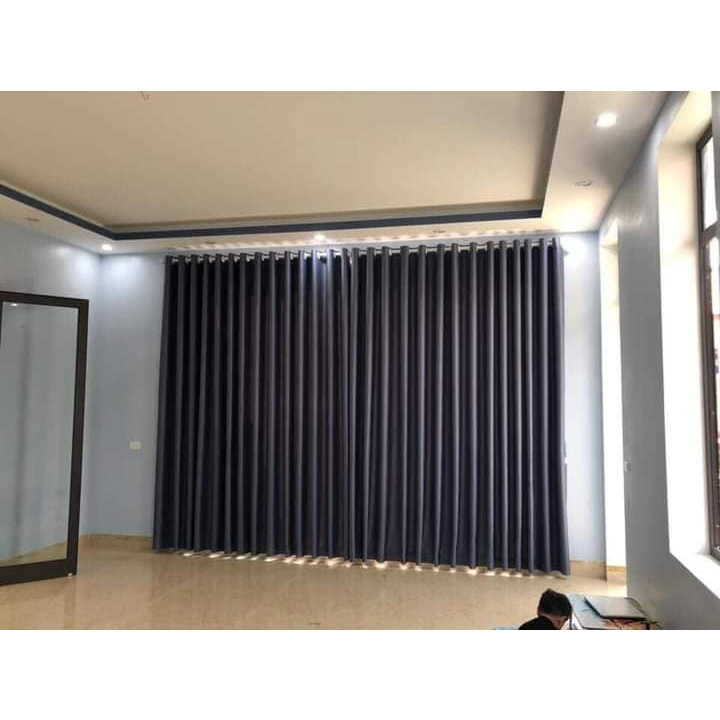 Rèm vải xám đậm ngăn phòng điều hòa gia đình