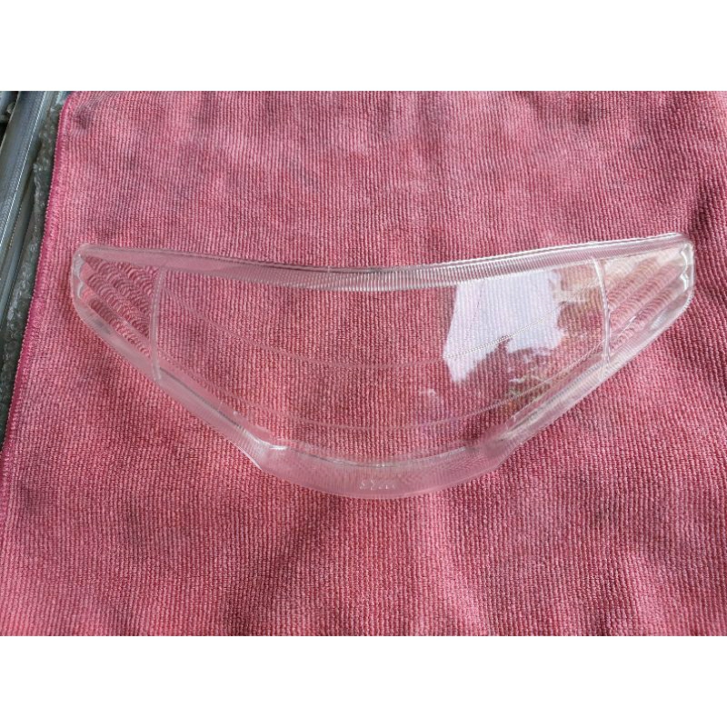 Kiếng chụp đèn pha SYM Angel100