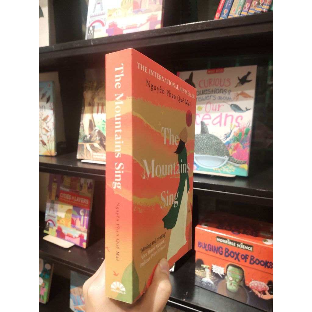 Sách - The Mountains Sing