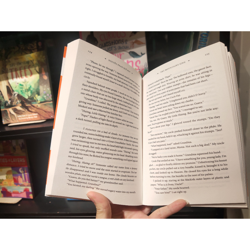 Sách - The Mountains Sing