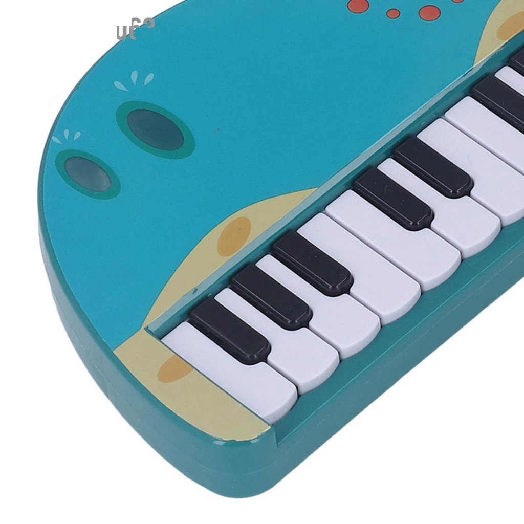 Đồ Chơi Đàn Piano Điện Tử Chạy Pin Hình Khủng Long Hoạt Hình Cho Bé