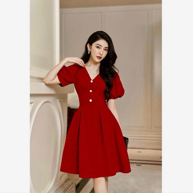 Đầm nữ tay phồng cổ tim đính nút