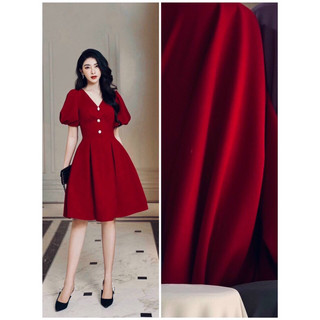 Đầm nữ tay phồng cổ tim đính nút