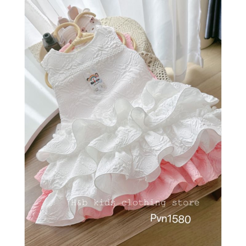 Đầm xốp hoa vân nổi hoa hồng phối tầng đuôi cá bồng bềnh xinh xắn cho bé 8-17kg